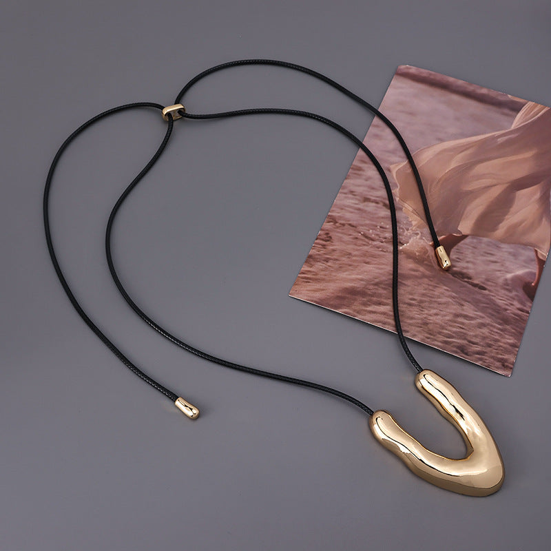 Sculptural U Pendant Cord Necklace